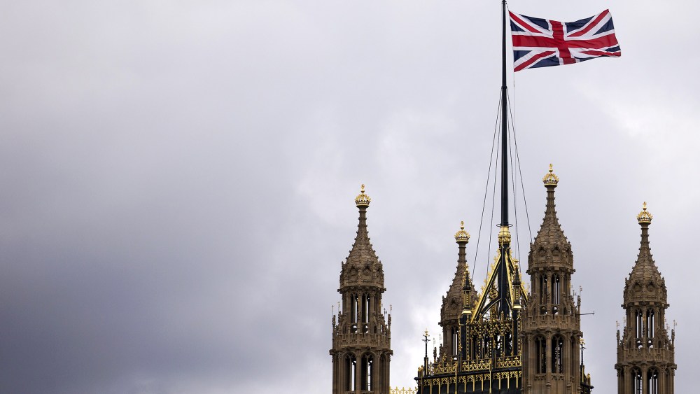The Union flag flying above the Houses of Parliament where lawmakers are expected to vote in favour of joining air strikes against Islamic State (IS) militants in central London on 26 September, 2014. Photo by Justin Tallis/Getty.