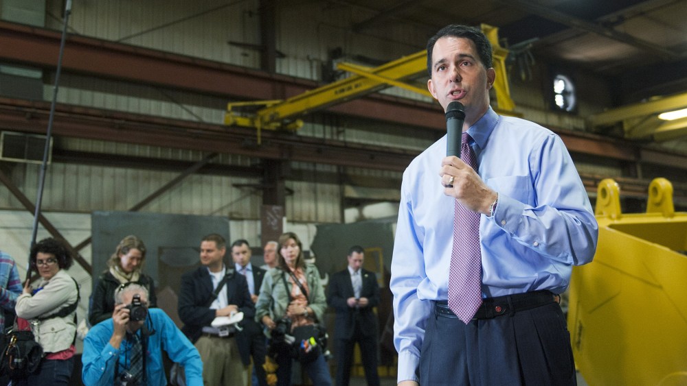 Wisconsin Gov. Scott Walker speaks at Empire Bucket, a manufacturing facility on Sept. 29, 2014 in Hudson, Wisconsin. (Photo by Stephen Maturen/Getty)