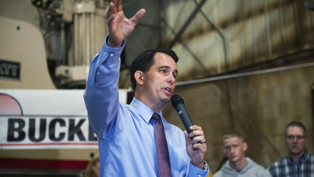 Wisconsin Gov. Scott Walker speaks at Empire Bucket, a manufacturing facility September 29, 2014 in Hudson, Wisconsin.