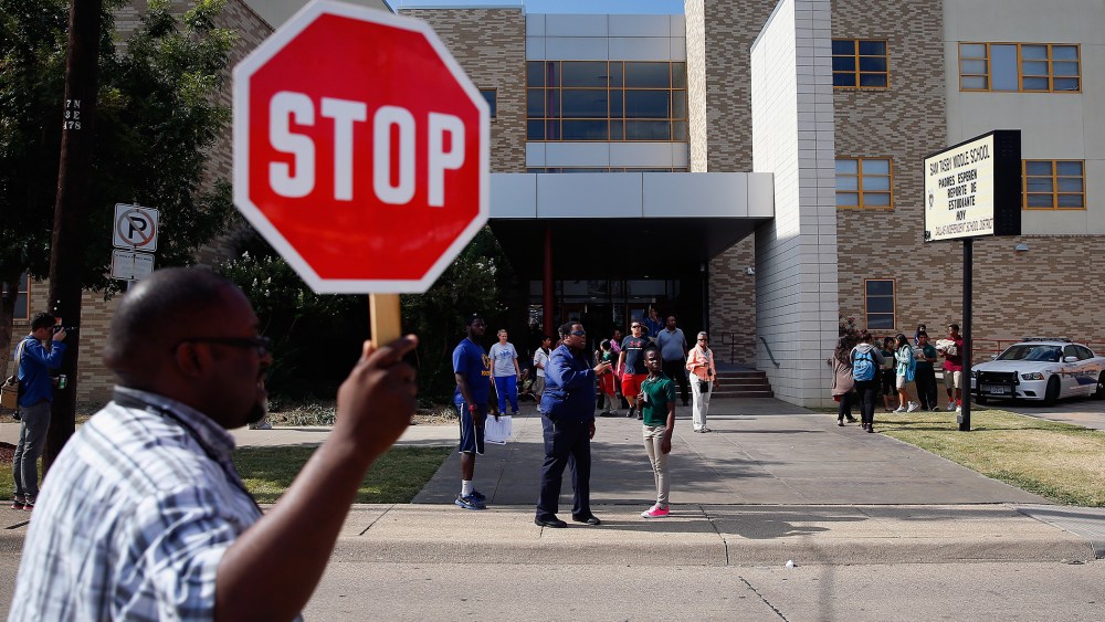 Students are dismissed from Sam Tasby Middle School on Oct. 1, 2014 in Dallas, Texas. Officials confirmed that a student, who had contact with the first confirmed Ebola virus patient in the United States, attends classes at the school.