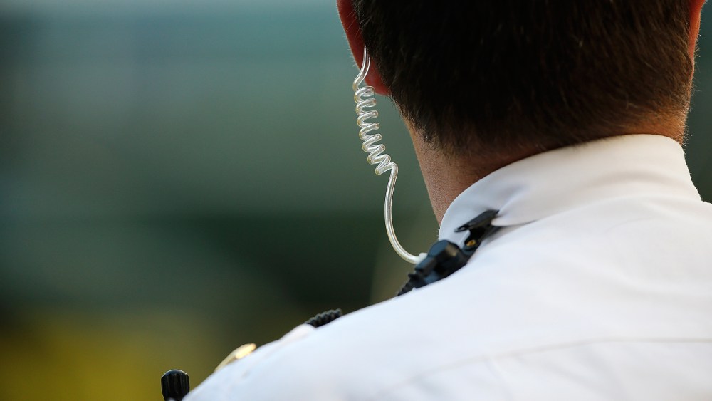 A member of the U.S. Secret Service stands watch at the White House. (Photo by Win McNamee/Getty)