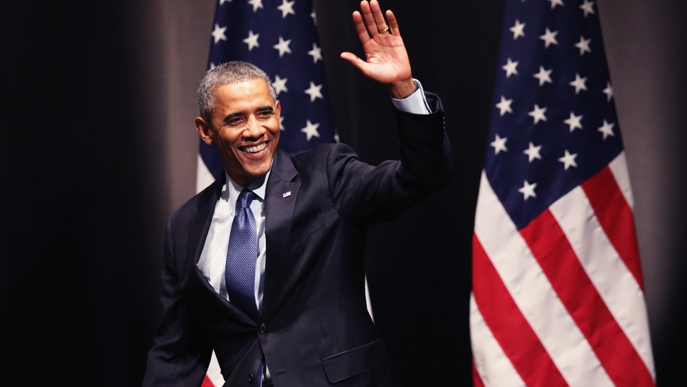 President Barack Obama waves to guests as he arrives for a speech on Oct. 2, 2014 in Evanston, Illinois. (Photo by Scott Olson/Getty)