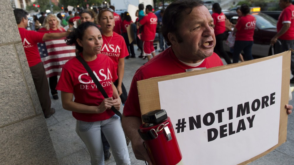 Immigration activits protest President Barack Obama's immigration policies in Washington, DC, Oct. 2, 2014.
