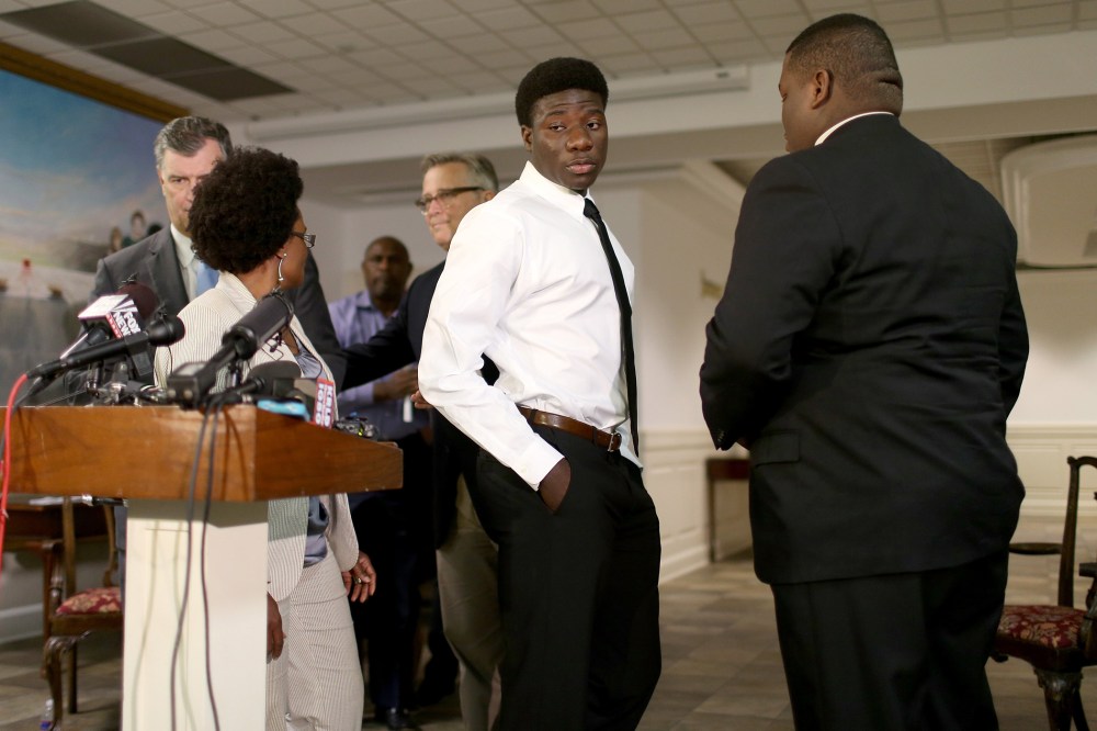 Karsiah Duncan, (C) the son of Ebola patient, Thomas Eric Duncan, leaves after speaking to the media at the Wilshire Baptist Church on Oct. 7, 2014 in Dallas, Texas.