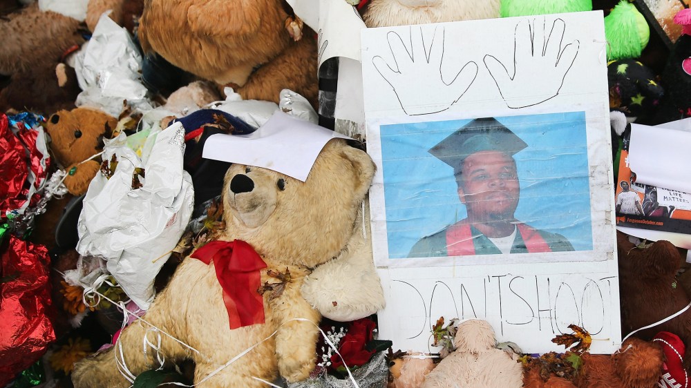 A makeshift memorial sits near the spot where 18-year-old Michael Brown was shot and killed by a police officer, Oct. 10, 2014 in Ferguson, Mo. (Scott Olson/Getty)