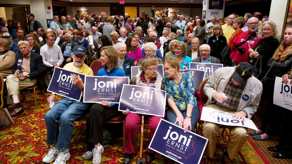 Supporters of Iowa Republican State Senator and U.S. Senate candidate Joni Ernst wait for a rally on Oct. 11, 2014 in Cedar Rapids, Iowa. (Photo by David Greedy/Getty)