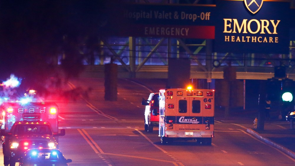 Ebola patient Amber Vinson arrives by ambulance at Emory University Hospital on Oct. 15, 2014 in Atlanta, Ga. (Photo by Kevin C. Cox/Getty)