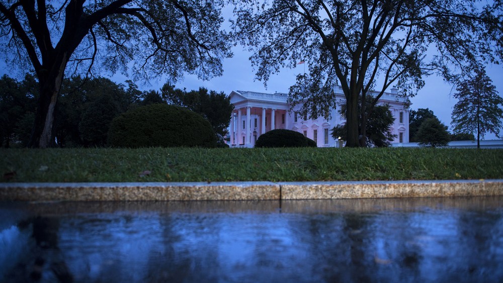 An evening view of the White House October 15, 2014 in Washington, D.C. (Photo by Brendan Smialowski/AFP/Getty)
