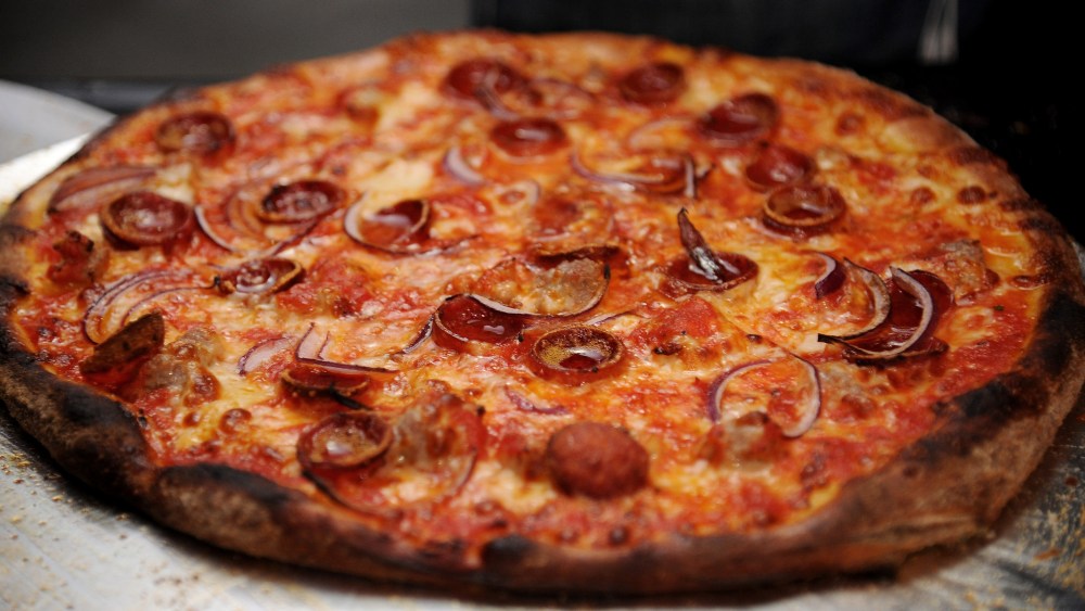 A view of pizza at a chef station at Ronzoni's La Sagra Slices hosted by Bongiovi Brand pasta sauces & Adam Richman presented by Time Out New York during the Food Network New York City Wine & Food Festival. (Photo by Bryan Bedder/Getty)