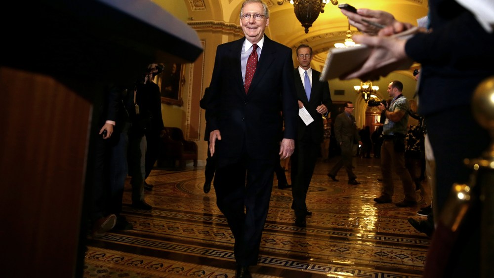 U.S. Senate Minority Leader Sen. Mitch McConnell (R-KY) approachs the podium for a media briefing on Dec. 17, 2013 on Capitol Hill in Washington, DC.