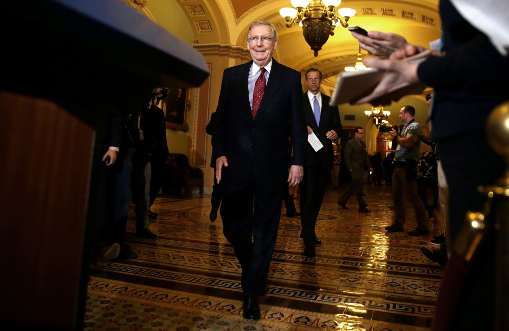 U.S. Senate Minority Leader Sen. Mitch McConnell (R-KY) approachs the podium for a media briefing on Dec. 17, 2013 on Capitol Hill in Washington, DC.