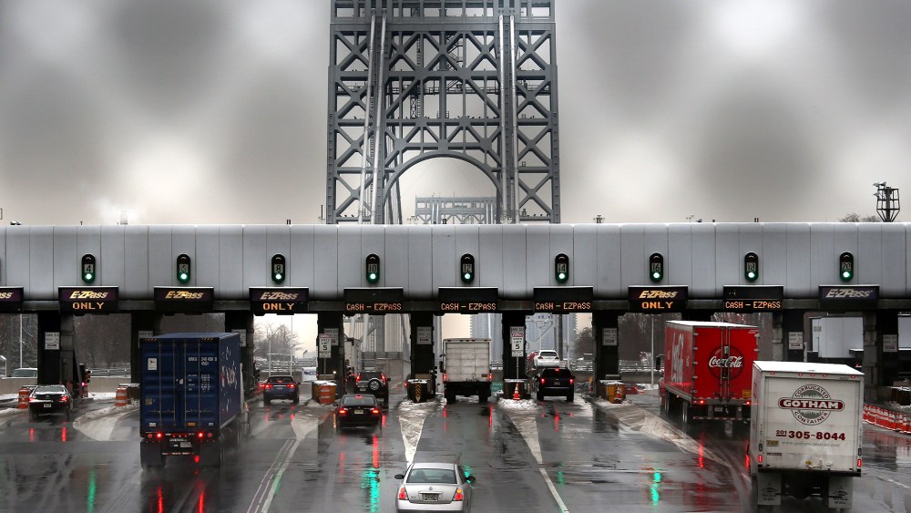 Vehicles slow for tolls before crossing the George Washington Bridge on December 17, 2013 in Ft. Lee, New Jersey.