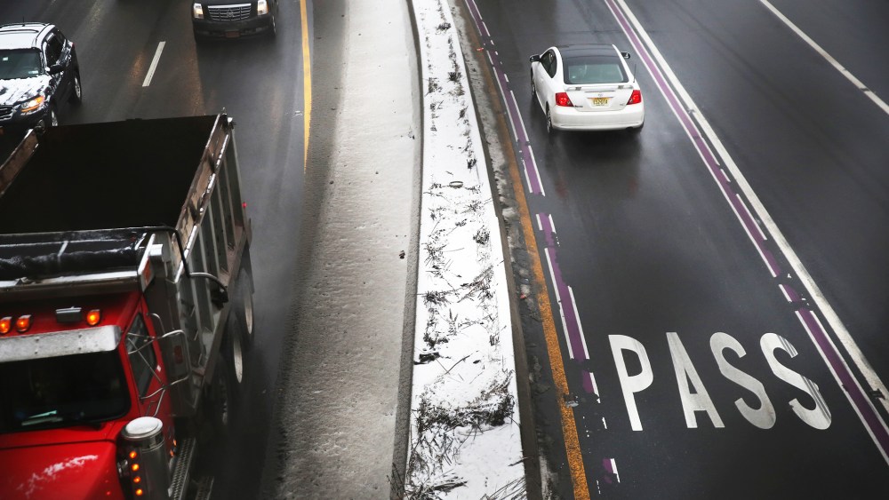 Vehicles slow at a toll booth at the George Washington Bridge on December 17, 2013.