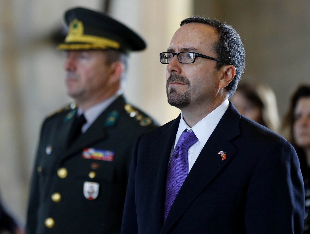 The new US ambassador to Turkey John Bass stands in silence as he visits Anitkabir, Ataturk's mausoleum, on Oct. 21, 2014 in Ankara, Turkey. (Photo by Murat Kaynak/Anadolu Agency/Getty)