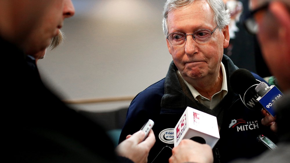Senate Minority Leader Mitch McConnell (R-Ky.) answers questions from members of the press after speaking at a campaign rally Oct. 22, 2014 in Grayson, Ky. (Photo by Win McNamee/Getty)