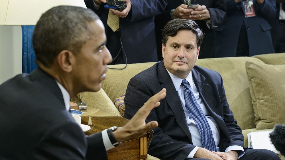 Ebola response coordinator Ron Klain listens while US President Barack Obama speaks in the Oval Office on Oct. 22, 2014 in Washington, DC. (Brendan Smialowski/AFP/Getty)
