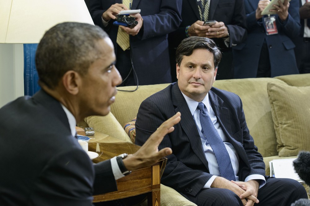 Ebola response coordinator Ron Klain listens while US President Barack Obama speaks in the Oval Office on Oct. 22, 2014 in Washington, DC. (Brendan Smialowski/AFP/Getty)