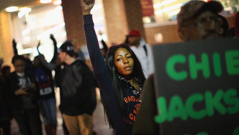 Demonstrators face off with police as protests continue in the wake of 18-year-old Michael Brown's death on Oct. 22, 2014 in Ferguson, Mo.