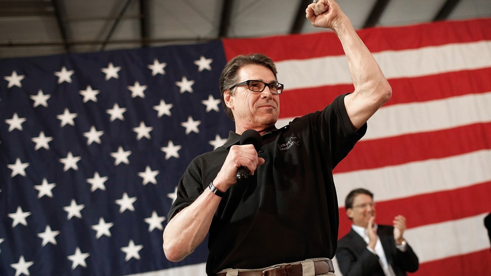 Texas Gov. Rick Perry campaigns for U.S. Senate Republican candidate and North Carolina House Speaker Thom Tills on Oct. 24, 2014 in Smithfield, N.C. (Win McNamee/Getty)