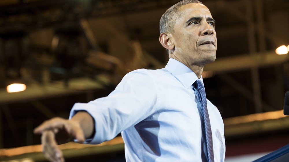 US President Barack Obama speaks during a rally at North Division High School on Oct. 28, 2014 in Milwaukee, Wis. (Photo by Brendan Smialowski/AFP/Getty)