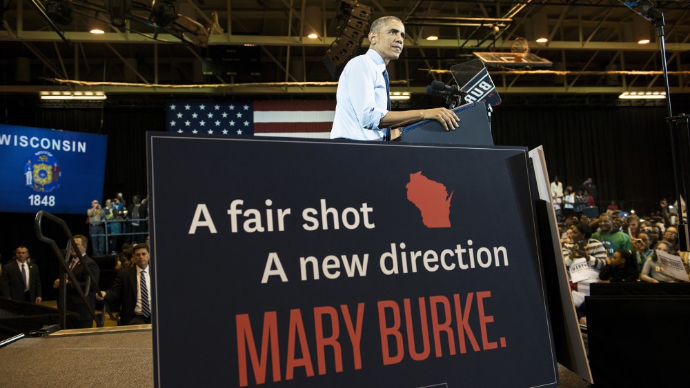 US President Barack Obama speaks during a rally at North Division High School Oct. 28, 2014 in Milwaukee, Wisconsin. (Photo by Brendan Smialowski/AFP/Getty)
