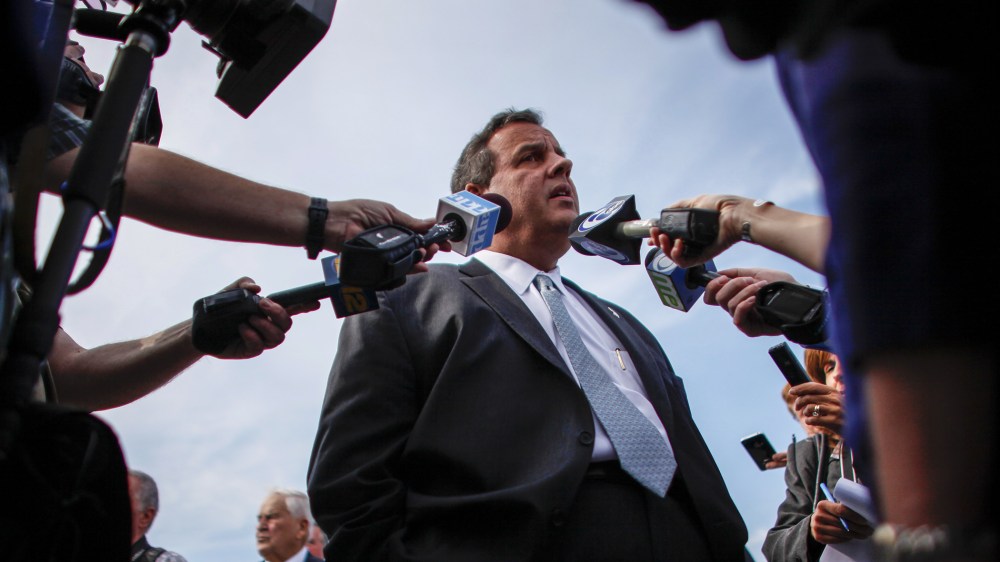 New Jersey Governor Chris Christie talks with members of the media as he visits the East Dover marina two years after Hurricane Sandy on Oct. 29, 2014 in Toms River, N.J. (Photo by Kena Betancur/Getty)