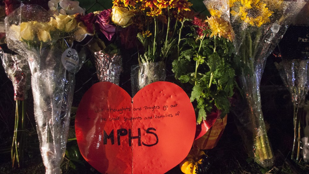 A memorial is pictured at Marysville-Pilchuck High School on Oct. 31, 2014 in Marysville, Wash. (Photo by David Ryder/Getty)