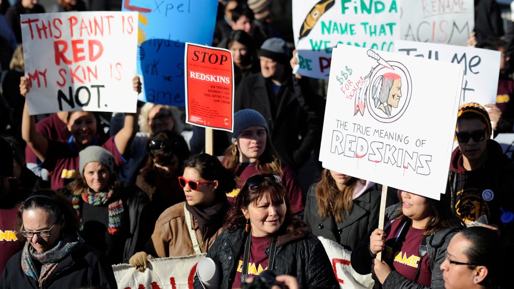 People march to TCF Bank Stadium to protest against the mascot for the Washington Redskins before the game against the Minnesota Vikings on Nov. 2, 2014 in Minneapolis, Minn. (Hannah Foslien/Getty)