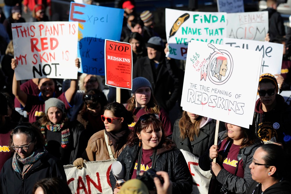 People march to TCF Bank Stadium to protest against the mascot for the Washington Redskins before the game against the Minnesota Vikings on Nov. 2, 2014 in Minneapolis, Minn. (Hannah Foslien/Getty)