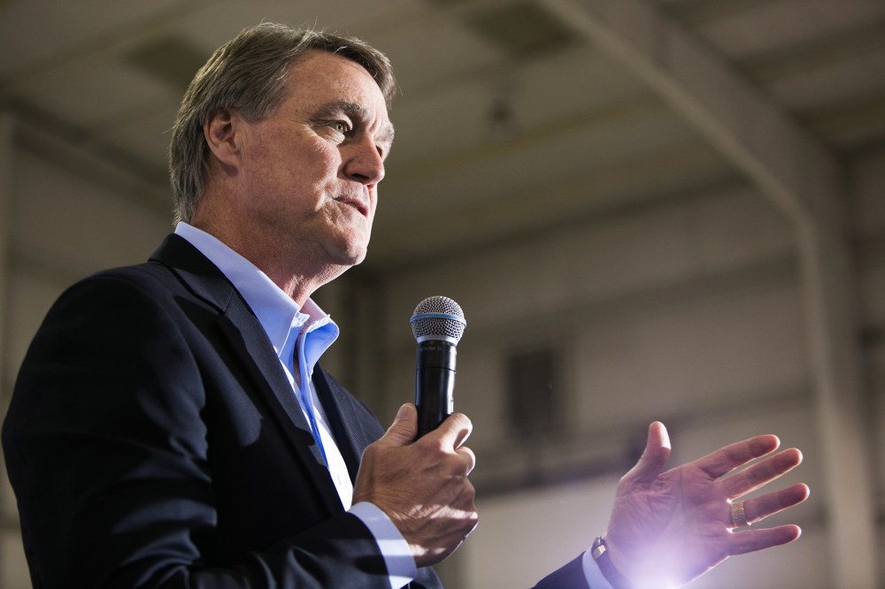 Republican candidate for U.S. Senate David Perdue speaks at a campaign stop one day before the mid-term elections on Nov. 3, 2014 in Atlanta, Ga.