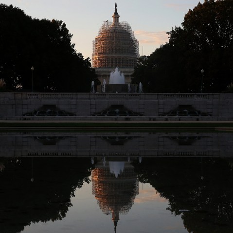 The U.S. Capitol is reflected in the Senate Park Reflecting pool, on Nov. 4, 2014 in Washington, DC. (Photo by Mark Wilson/Getty)