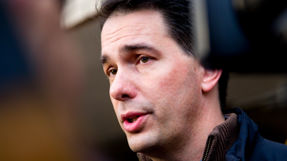 Wisconsin Gov. Scott Walker talks to the media after he casts his ballot on election day at Jefferson Elementary School on Nov. 4, 2014 in Milwaukee, Wis. (Darren Hauck/Getty)