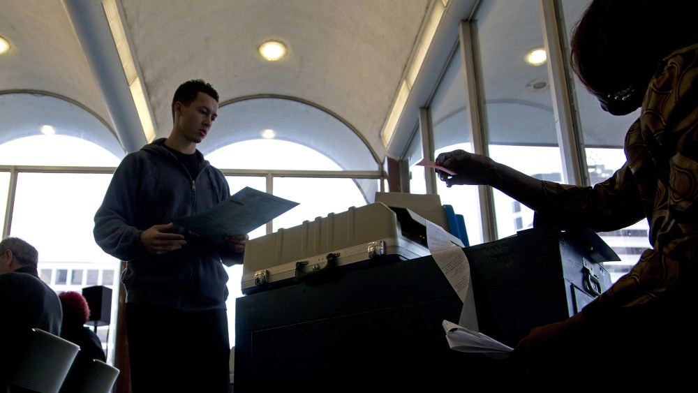 Citizens go to the cast their ballots at the city hall building on election day on Nov. 4, 2014 in Milwaukee, Wisc.