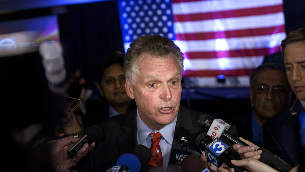 Virginia Governor Terry McAuliffe speaks to reporters on Nov. 4, 2014 in Arlington, Va. (Photo by Brendan Smialowski/AFP/Getty)