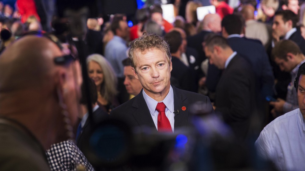 U.S. Sen. Rand Paul prepares for a television interview at U.S. Sen. Mitch McConnell's election night event on Nov. 4, 2014 in Louisville, Ky.