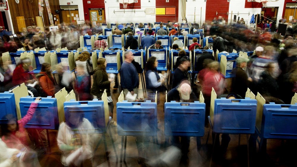 Voters streamed through the polls at Brunswick Junior High as night fell on election day in Brunswick, Maine on Nov. 4, 2014.