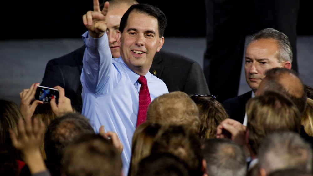 Wisconsin Gov. Scott Walker greets supporters at his election night party November 4, 2014 in West Allis, Wisc. (Darren Hauck/AP)