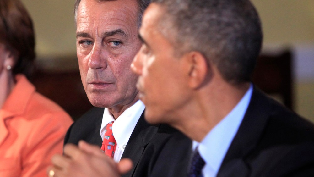 Speaker of the House John Boehner looks on as U.S. President Barack Obama meets with bipartisian congressional leadership in the Old Family Dining Room at the White House on Nov. 7, 2014 in Washington, DC.