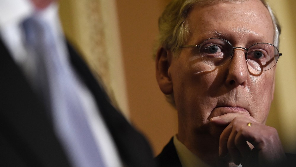 Senate Minority Leader Mitch McConnell (R-KY) answers questions following the weekly Republican policy luncheon at the U.S. Capitol on Nov. 13, 2014 in Washington, DC.