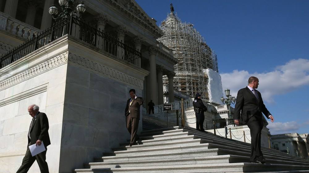 Members walk down the steps of the House side of the US Capitol after voting on the Keystone XL Pipeline, Nov. 14, 2014 in Washington, DC.