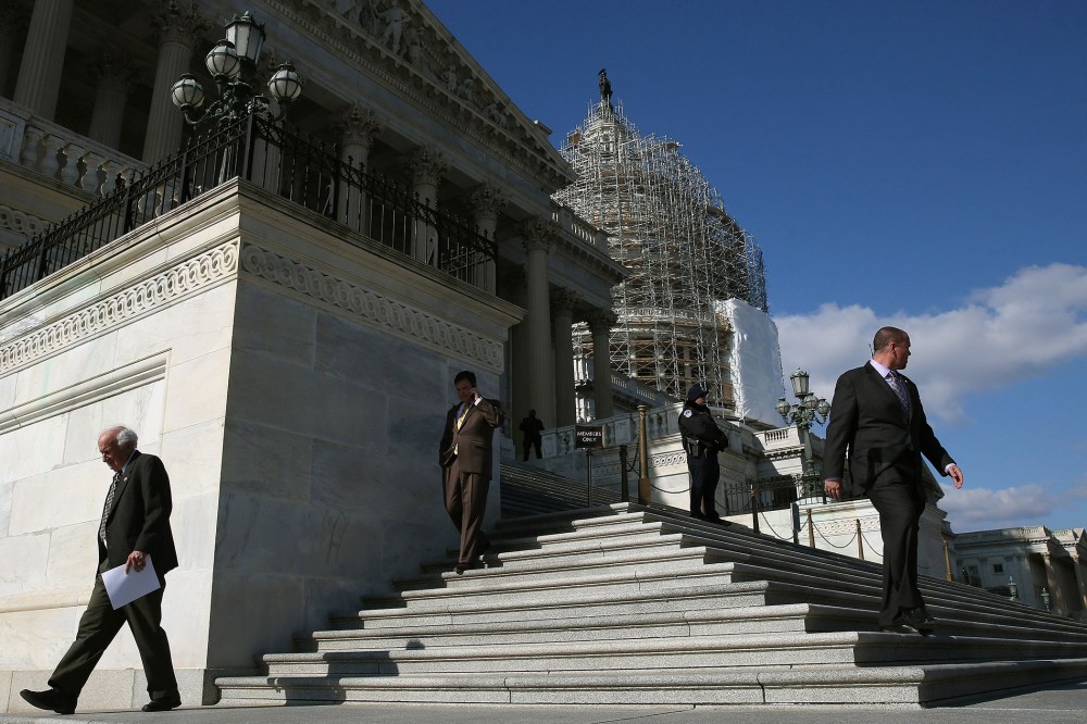 Members walk down the steps of the House side of the US Capitol after voting on the Keystone XL Pipeline, Nov. 14, 2014 in Washington, DC.