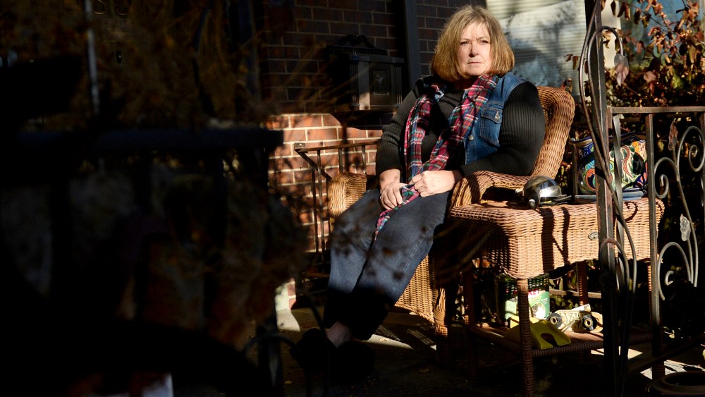 Kim Sayers, seen outside her home in Denver, faced losing her unemployment insurance benefits in December, 2013.