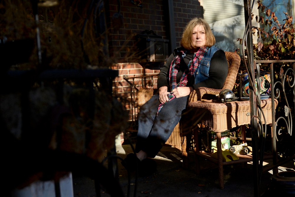 Kim Sayers, seen outside her home in Denver, faced losing her unemployment insurance benefits in December, 2013.
