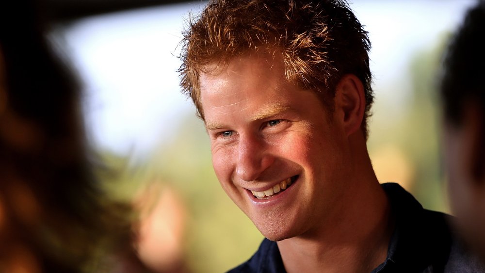 Prince Harry attends the Sentebale Polo Cup presented by Royal Salute World Polo at Ghantoot Polo Club on November 20, 2014 in Abu Dhabi, United Arab Emirates.