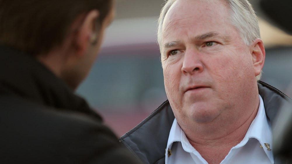 Ferguson Chief of Police Tom Jackson speaks to a television news crew across from the police station on Nov. 20, 2014 in Ferguson, Mo. (Photo by Scott Olson/Getty)