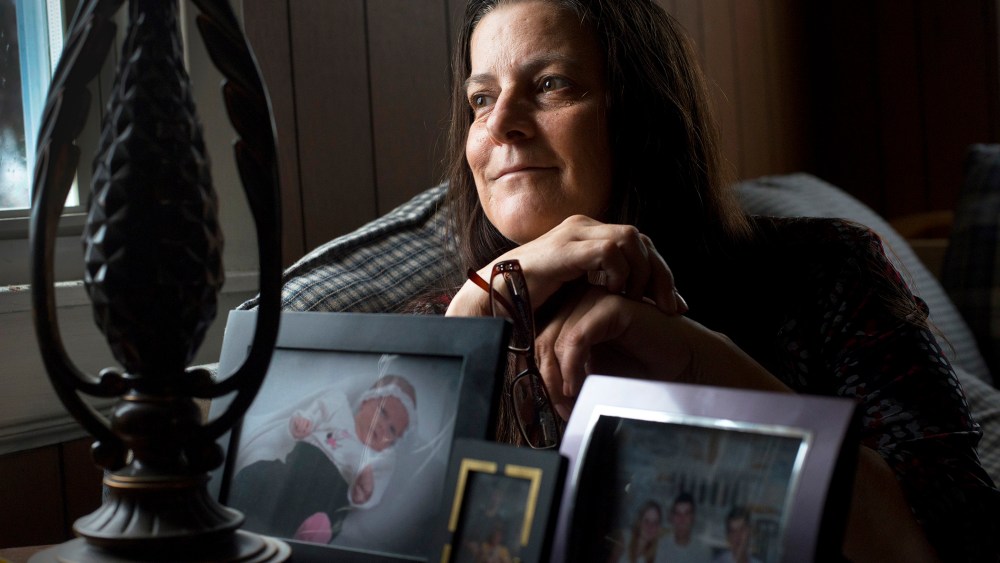 Kathy Biscotti, mother of three, tries to remain positive as she continues to job hunt in person and online in Baltimore, MD, Dec. 23, 2013.