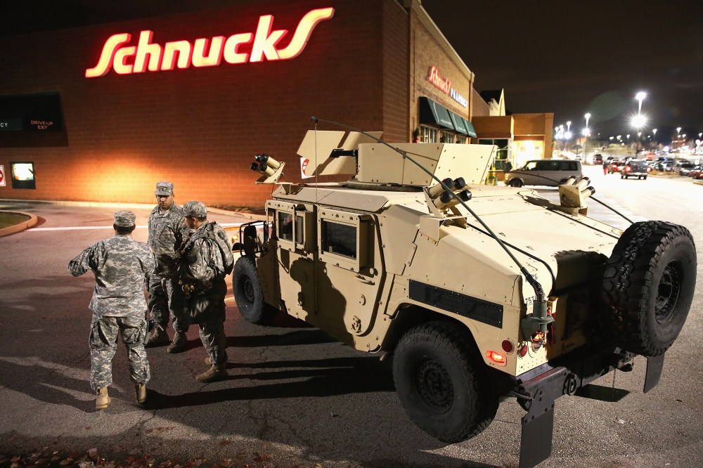National Guard troops arrive ahead of the grand jury announcement in the Michael Brown shooting case on Nov. 24, 2014 in Ferguson, Mo. (Photo by Scott Olson/Getty)