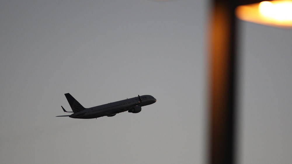 A United Airlines jet takes off. (Photo by David McNew/Getty)