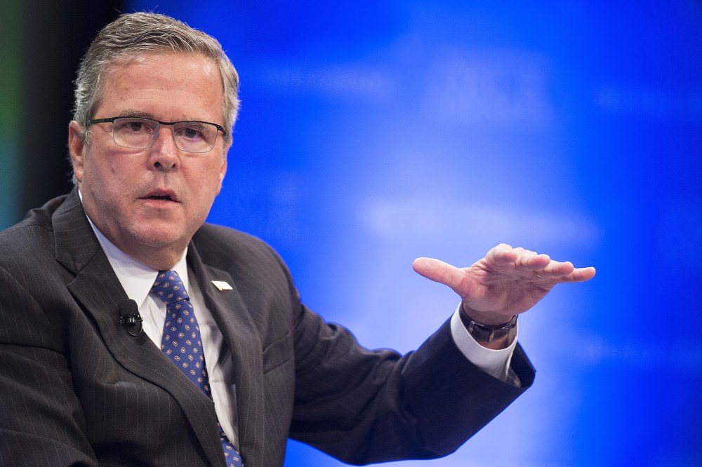 Former Florida Governor Jeb Bush speaks during the Wall Street Journal CEO Council in Washington, D.C. on Dec. 1, 2014. (Photo by Jim Watson/AFP/Getty)