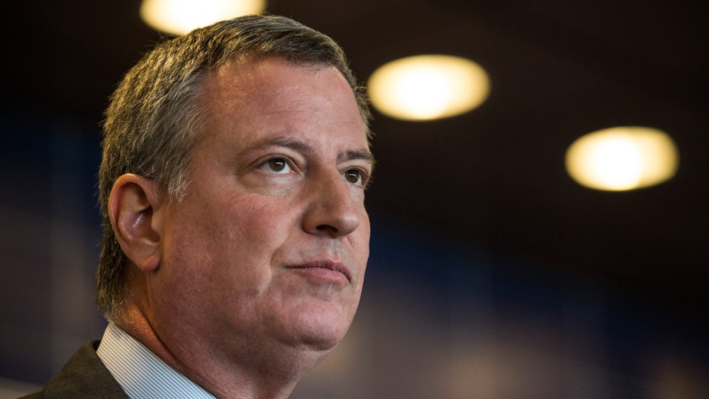 New York City Mayor Bill de Blasio speaks at a press conference after witnessing police being retrained with new guidelines at the Police Academy on Dec. 4, 2014 in the Queens borough of in New York City. (Andrew Burton/Getty)